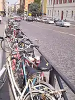 Bicycles locked to a railing