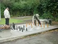 Large chess boardleisure=pitchsport=chesssurface=paving_stones