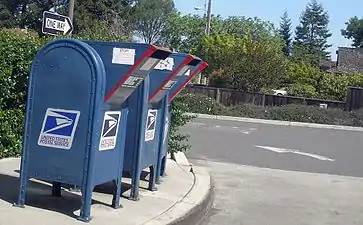 United States, operator:  United States Postal Service. A drive-through lane at a post office