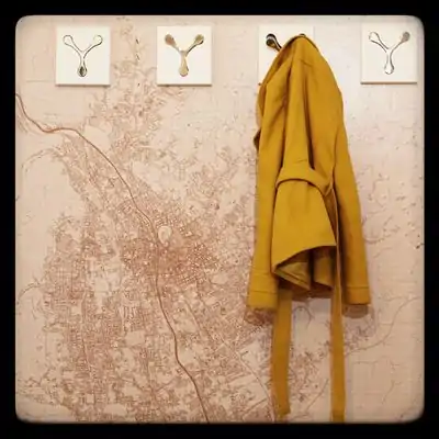 A reallife OpenStreetMap wallpaper with clothes hooks on top