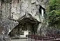 A lourdes grotto built in a real cliff face in Yvoir, Belgium