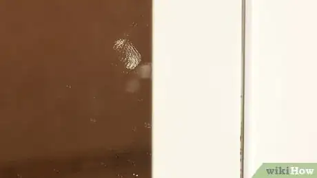 Image titled Clean Mirrors Without Streaks Step 5