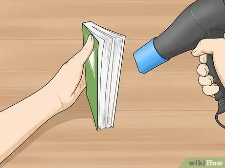 Image titled Remove the Mildew Smell from Books Step 2