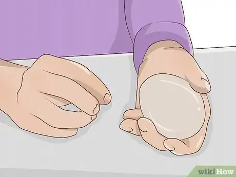 Image titled Deal with Postpartum Hair Loss Step 1