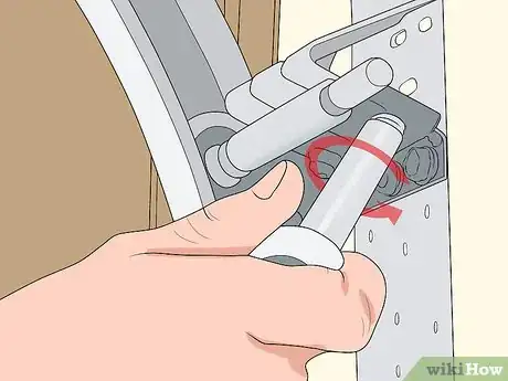 Image titled Adjust Garage Door Tracks Step 1