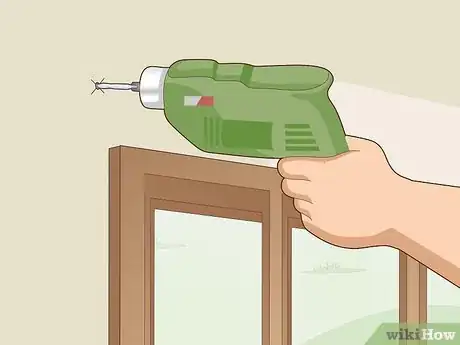 Image titled Hang Curtains with Wire Step 3