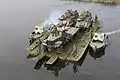 KrAZ-255 ferrying on its own PMP pontoon-bridge, Ukraine