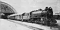 Mikado steam locomotive at the station, unknown year.