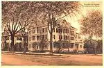 41 Elm Street,  Northampton, MA.  1900 photo shows addition of Victorian-era porches.  Originally built c.&nbsp;1810.  Federal style.