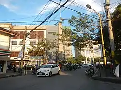 H. Santos Street with Carmona Sports Complex and Circuit Makati on the background