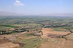 An aerial view from the window of a Blackhawk helicopter between Balkh Province and Kunduz Province