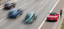 Image 17Vehicles experiencing a breakdown or an emergency can stop in the emergency lane; these lanes may themselves present risks to traffic. (from Road traffic safety)