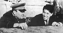 Kim and Soviet colonel general Prokofy Romanenko in December 1945