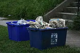 Durham recycling containers ready for pickup on the curb of Vickers Avenue