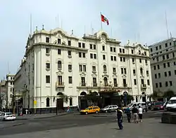 Photograph of a white five-story building