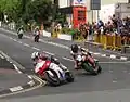 Supersport TT Race 1 Lap 4&nbsp;– Michael Dunlop (6), Bruce Anstey (5), John McGuinness (3) & James Hillier (1) Parliament Square, Ramsey 3 June 2013.