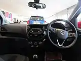 Dashboard of right-hand drive car with manual gearbox and rotary climate controls
