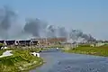 View on Deinum with a car fire on the motorway