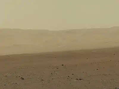 Gale Crater rim about 18&nbsp;km (11&nbsp;mi) North of the Curiosity rover on August 9, 2012