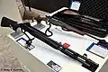 Since this shotgun has an internal magazine, compensator and iron sights, it could be used in the Modified division.