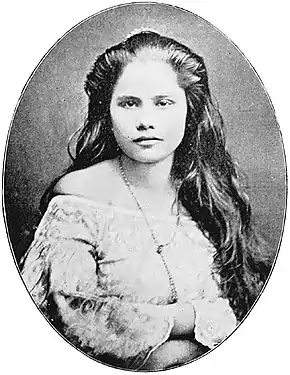 A Tagalog woman in traditional dress, c. 1900