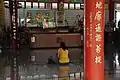 A devout praying in the temple.