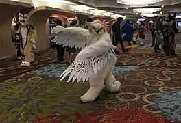 A gryphon fursuiter