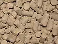 Manufactured pelleted feed ration for cattle