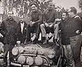 Hopkirk (second on the right) at the 1965 1000 Lakes Rally