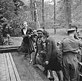Princess Juliana, Queen Wilhelmina and Rie Stokvis climb the front steps upon their arrival