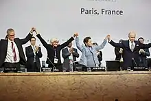 Image 12The Paris Agreement (formerly the Kyoto Protocol) is adopted in 2016. Nearly every country in the United Nations has signed the treaty, which aims to reduce greenhouse gas emissions. (from Environmental science)