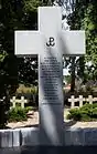 The Kotwica on a monument in the cemetery dedicated to the Kampinos Group of the Armia Krajowa in Budy Zosine.