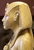 Profile of a statuette of Akhenaten wearing a nemes, c. 1351&nbsp;– c. 1332&nbsp;BC