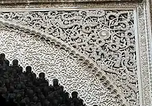 Example of arabesque motifs in carved stucco at the 14th-century Al-Attarine Madrasa