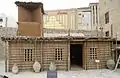 Replica of a vernacular house in Dubai, including a windcatcher.