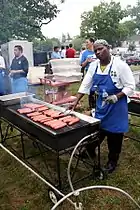 Hot dogs being grilled