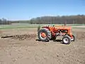A-C Model D17 pulling a 12' Spring-Tooth Harrow