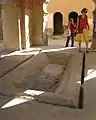 The water basin under the dome. The main basin is surrounded by a thin trench where spilled water could be drained.