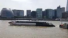 Thames Clipper Boat on the River Thames in new black and white branding