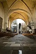Southern French Gothic nave and northern Gothic choir.