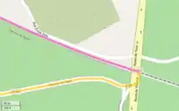 Area map of the crash site with routes of school bus (yellow line) and train (purple line) before collision.