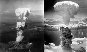 Two mushroom clouds rise vertically.