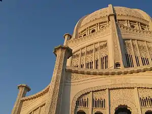 Image 21Symbols of many religions are carved in concrete relief on the exterior of the Bahá'í House of Worship in Wilmette.  The temple was designed by the architect Louis Bourgeois and constructed between 1921 and 1953. Image credit: ctot_not_def (photographer), Tobias Vetter (upload) (from Portal:Illinois/Selected picture)