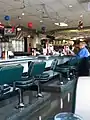 Bar seating at a Mels Drive-In