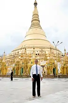 Image 20Former US President Barack Obama poses barefoot on the grounds of Shwedagon Pagoda, one of Myanmar's major Buddhist pilgrimage sites. (from Culture of Myanmar)
