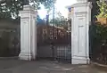 Gate on Beatrice Lane also used as the main entrance