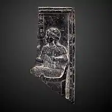 Fragment of a bas-relief with goddess Ninsun; 2255-2040 BC; steatite; height: 14&nbsp;cm; Louvre