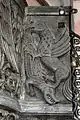 Struggle between a griffin and a crocodile
