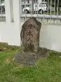 Japanese monument at the main road leading to the camp.