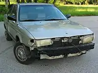 A decrepit car.